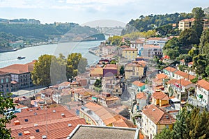 Porto Oporto town architecture with Douro river and Arrabida bridge background