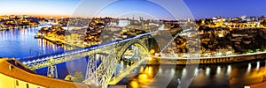 Porto Portugal with bridge Ponte Dom Luis I Douro river town travel panorama at twilight