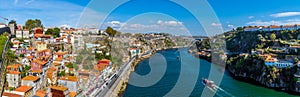 Porto, Portugal old town ribeira aerial promenade view with colorful houses, Douro river, panoramic view