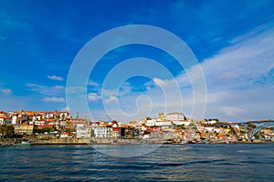 Porto, Portugal, Riberia old town cityscape with colorful houses, Dom Luis bridge, seen form Douro River