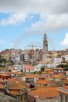 Porto, Portugal - September 17, 2023. View of the old town and Tower of Clerigos. Cloudy day