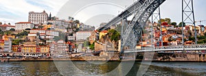 Porto, The Ribeira District, Portugal old town ribeira view with colorful houses and Luis I Bridge - a metal arch bridge over