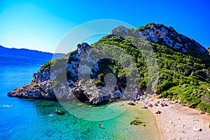 Porto Timoni beach at Afionas is a paradise double beach with crystal clear azure water in Corfu, Ionian island, Greece, Europe