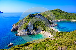 Porto Timoni beach at Afionas is a paradise double beach with crystal clear azure water in Corfu, Ionian island, Greece, Europe