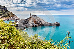 Porto Venere, Italy with church of St. Peter on cliff.