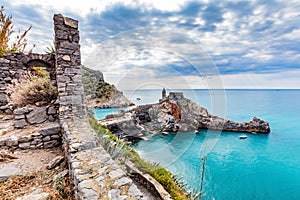 Porto Venere, Italy with church of St. Peter on cliff.