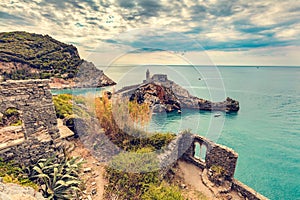 Porto Venere, Italy with church of St. Peter on cliff.