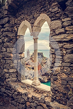 Porto Venere, Italy with church of St. Peter seen from ancient window