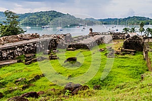 PORTOBELO, PANAMA - MAY 28, 2016: Sail boats and Fuerte Santiago fortress in Portobelo village, Pana