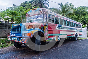 PORTOBELO, PANAMA - MAY 28, 2016: Colorful chicken bus, former US school bus. in Portobelo village, Pana