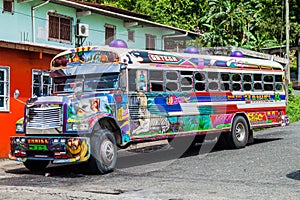 PORTOBELO, PANAMA - MAY 28, 2016: Colorful chicken bus, former US school bus. in Portobelo village, Pana