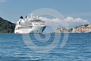 Portovenere in the gulf of poets, with docked cruise ship photo