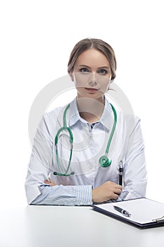 Portraif of Professional Female Caucasian Otolaryngologist Posing Against White Background