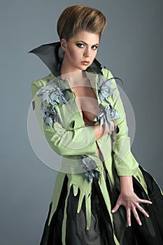 Portrait of 19-th century dressed model at studio