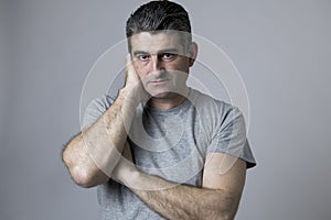 Portrait of 40s to 50s sad and worried man looking frustrated and hopeless in stress and sorrow face expression isolated