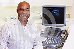 Portrait Of 4D Ultrasound Scanning Machine Operator And Doctor
