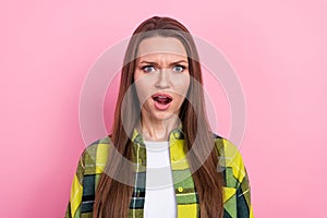 Portrait of abused offended confused girl with straight hairdo wear plaid shirt staring open mouth isolated on pink