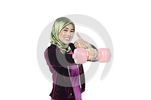 Portrait of a active healthy hijab woman and dumbells for promoting a healthy fitness and lifestyle concept.isolated white