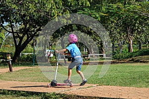 Cute little girl playing as a little archaeologist with her mother digging dinosaur fossils in the playground. Children learning