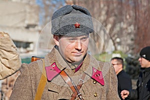 Portrait of actor dressed as Russian Soviet soldier of World War II in reconstruction of the capture of field Marshal Paulus in Vo