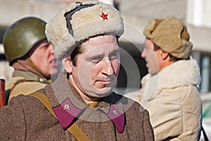 Portrait of actor dressed as Russian Soviet soldier of World War II in reconstruction of the capture of field Marshal Paulus in Vo