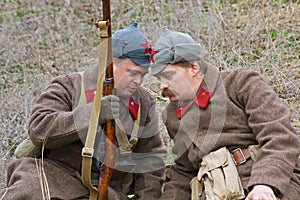 Portrait of actors dressed as Russian Soviet Soldier of World War II in military-historical reconstruction in Volgograd.