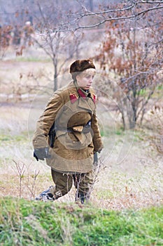 Portrait of actress dressed as Russian Soviet soldier of World War II in military-historical reconstruction in Volgograd.