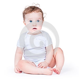 Portrait of an adorable baby girl with blue eyes