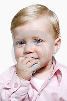 Portrait of adorable baby on a white background