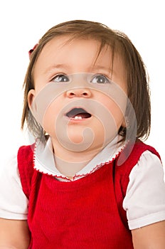 Portrait of adorable brunette baby girl wearing