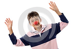 Portrait of an adorable child with a clown nose