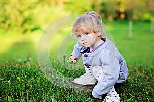 Portrait of adorable child girl walking outdoors