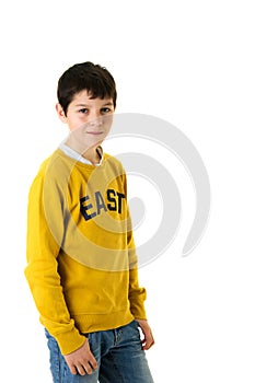 Portrait of adorable child standing isolated against white background