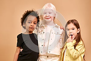 Portrait of adorable diverse children isolated photo