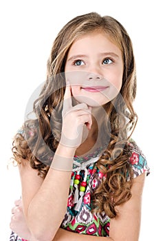 Portrait of adorable dreaming little girl isolated