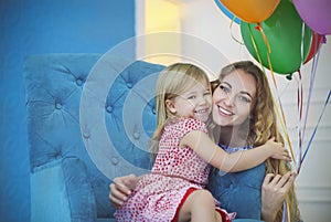 Portrait of adorable little baby girl celebrating birthday with