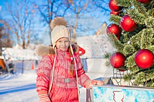 Portrait of adorable little girl near Christmas