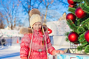 Portrait of adorable little girl near Christmas