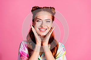 Portrait of adorable lovely woman with foxy hairstyle wear print shirt plams presenting toothy smile isolated on pink