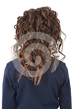 Portrait of adorable smiling girl child schoolgirl with curl hair