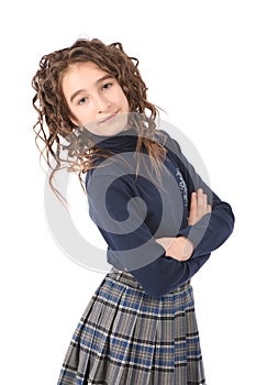 Portrait of adorable smiling girl child schoolgirl with curl hair