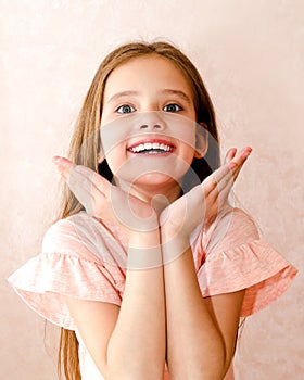 Portrait of adorable smiling little girl child