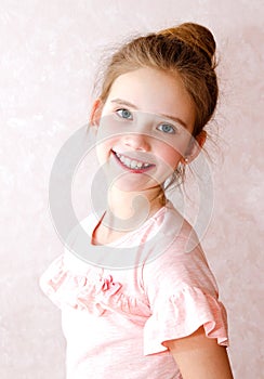 Portrait of adorable smiling little girl child