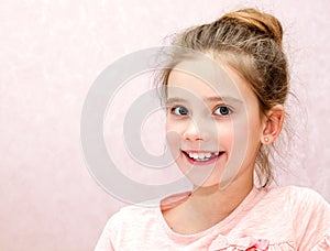 Portrait of adorable smiling little girl child