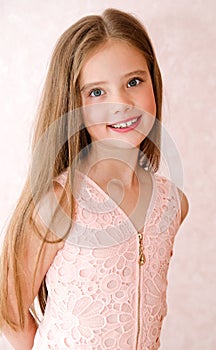 Portrait of adorable smiling little girl child