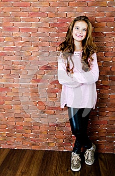 Portrait of adorable smiling standing little girl child