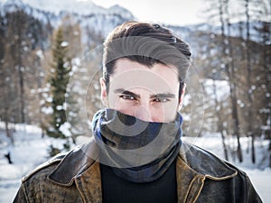 Sexual young man covered with scarf