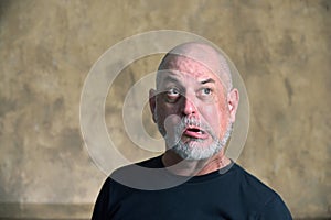 portrait adult man bald white beard face expression anger scared thoughtful male model gentleman in black clothes image