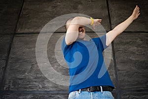 Portrait of adult man in blue t-shirt