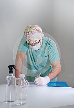 Portrait of adult man doctor or nurse working in a hospital